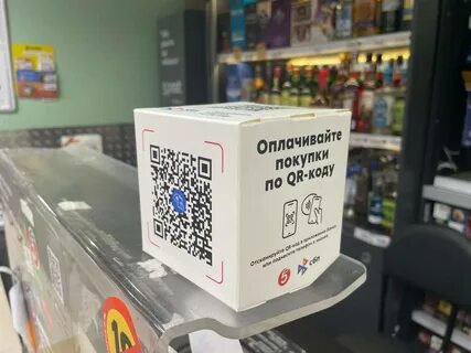 QR-код на кассе магазина