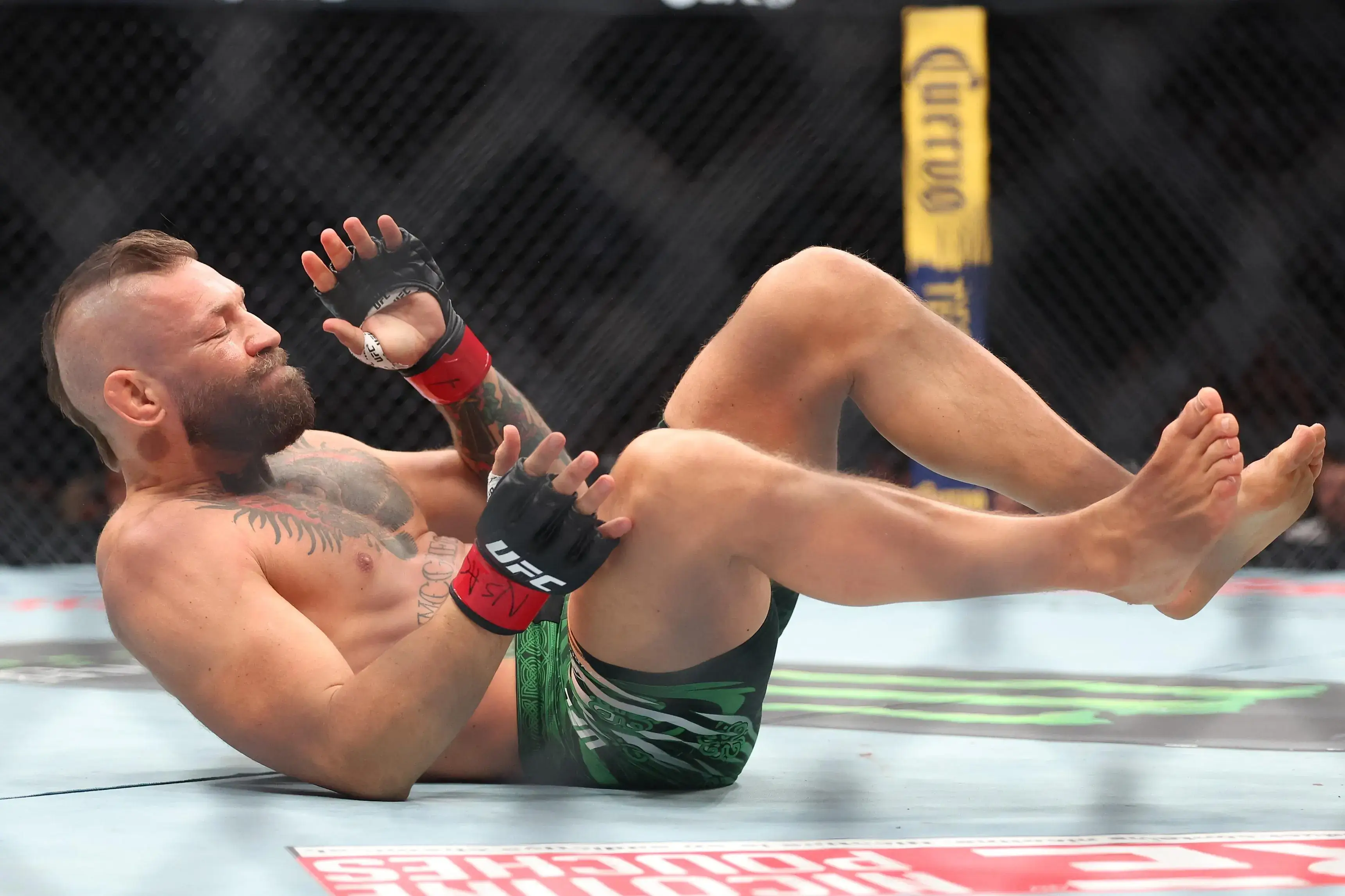 UFC 329 fight card poster McGregor Holloway